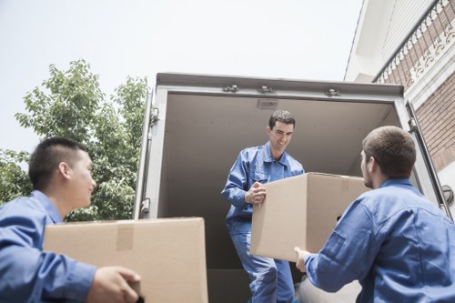 Customer service representative assisting with storage options in Wimbledon
