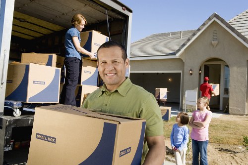 Professional movers assisting with a residential move in Wimbledon